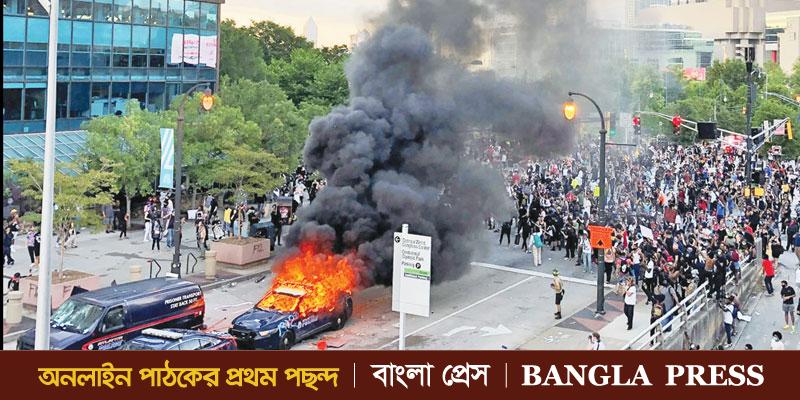 অষ্টম দিনেও উত্তাল যুক্তরাষ্ট্র